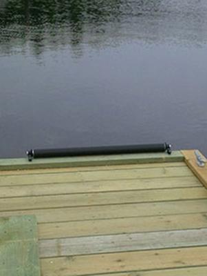 Roll-Aid attached to dock for easy entry of kayak into the water.